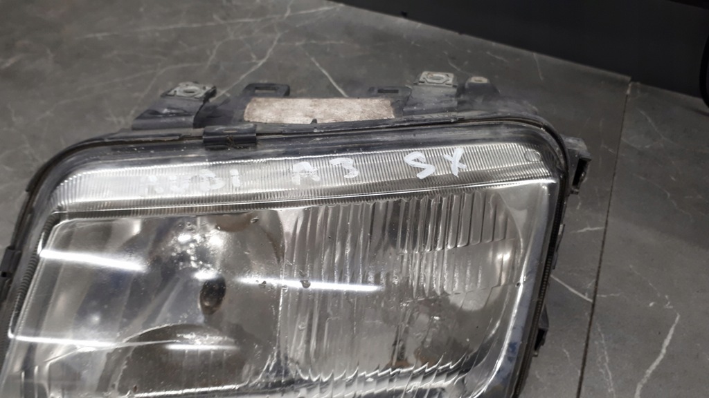 963035-00 Fața de far stângă Audi A3 Hella 8L 97R Product image