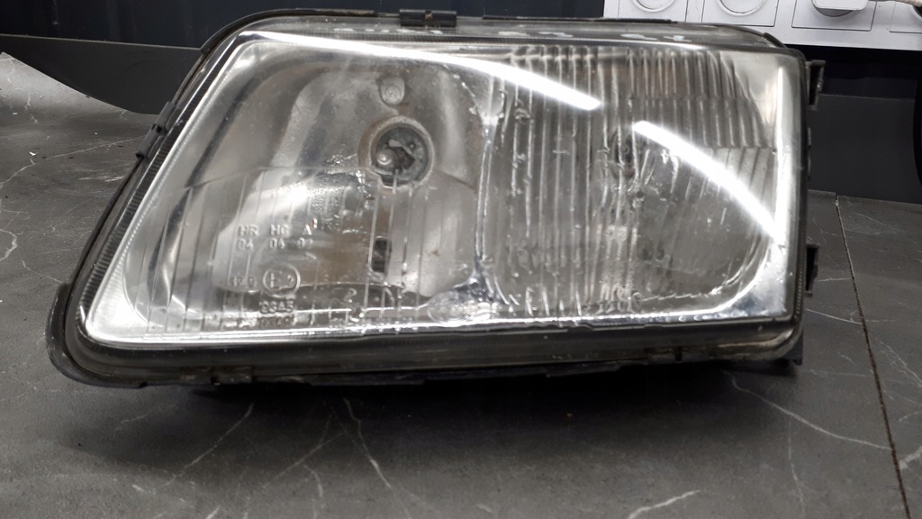 963035-00 Fața de far stângă Audi A3 Hella 8L 97R Product image