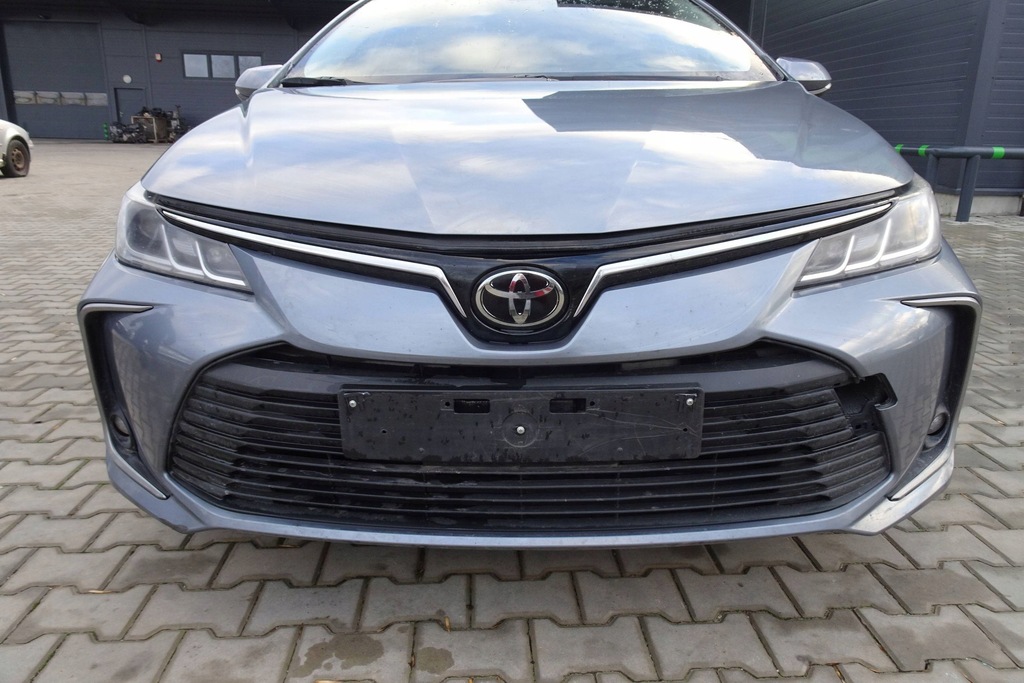 TOYOTA COROLLA E21 SEDAN CAPOTA BARA LAMPA COMPLET FATA 19- Product image