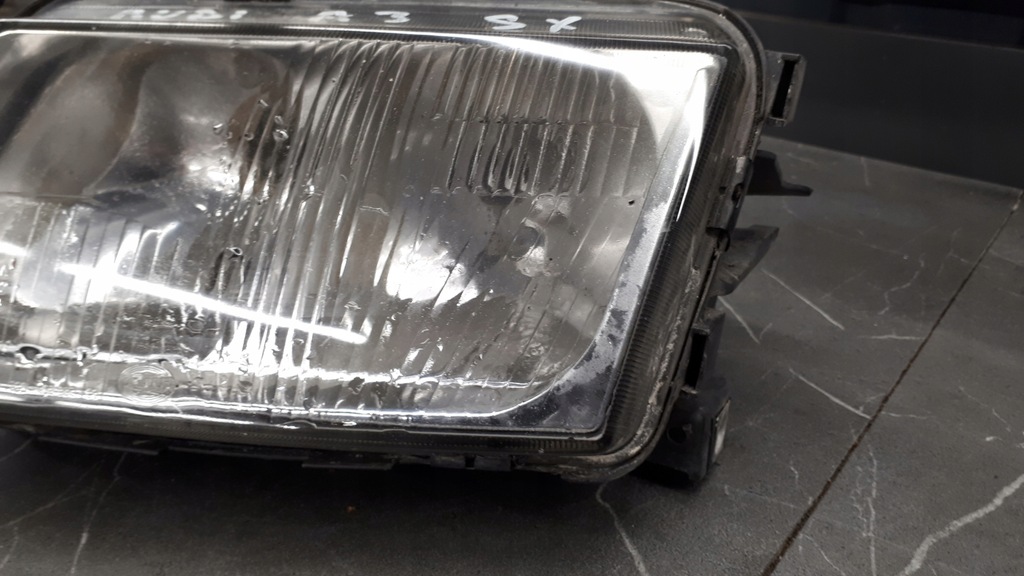 963035-00 Fața de far stângă Audi A3 Hella 8L 97R Product image